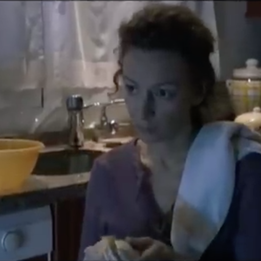 Mujer en cocina fotograma Desconocidos