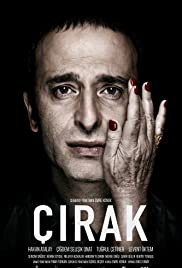 Cartel de Cirak, un hombre con la mano de una mujer en su cara de primer plano el hombre tiene una expresion preocupada
